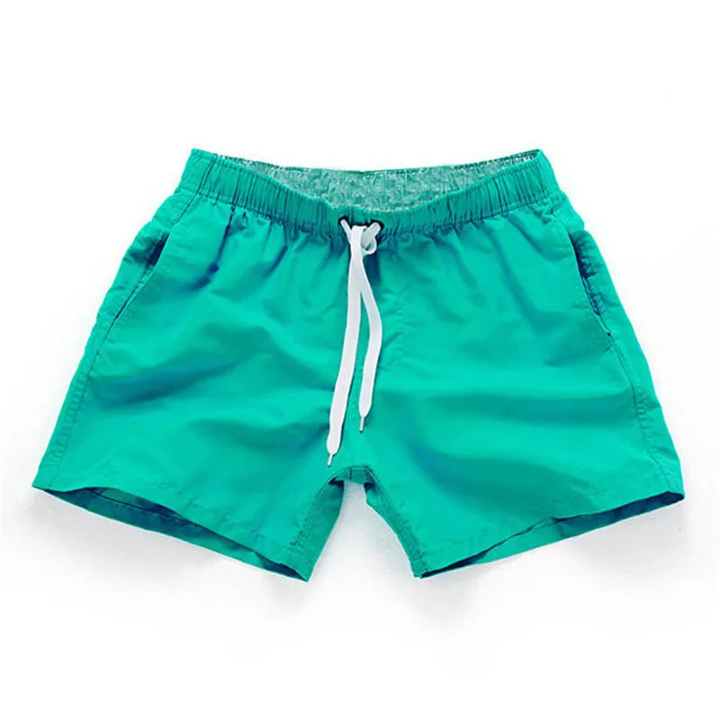 Men's straight leg beach shorts in polyester fabric available in multiple colours and sizes S to 4XL