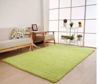 Solid colour fluffy plush rectangle carpet showing soft pile and non-slip dotted bottom.