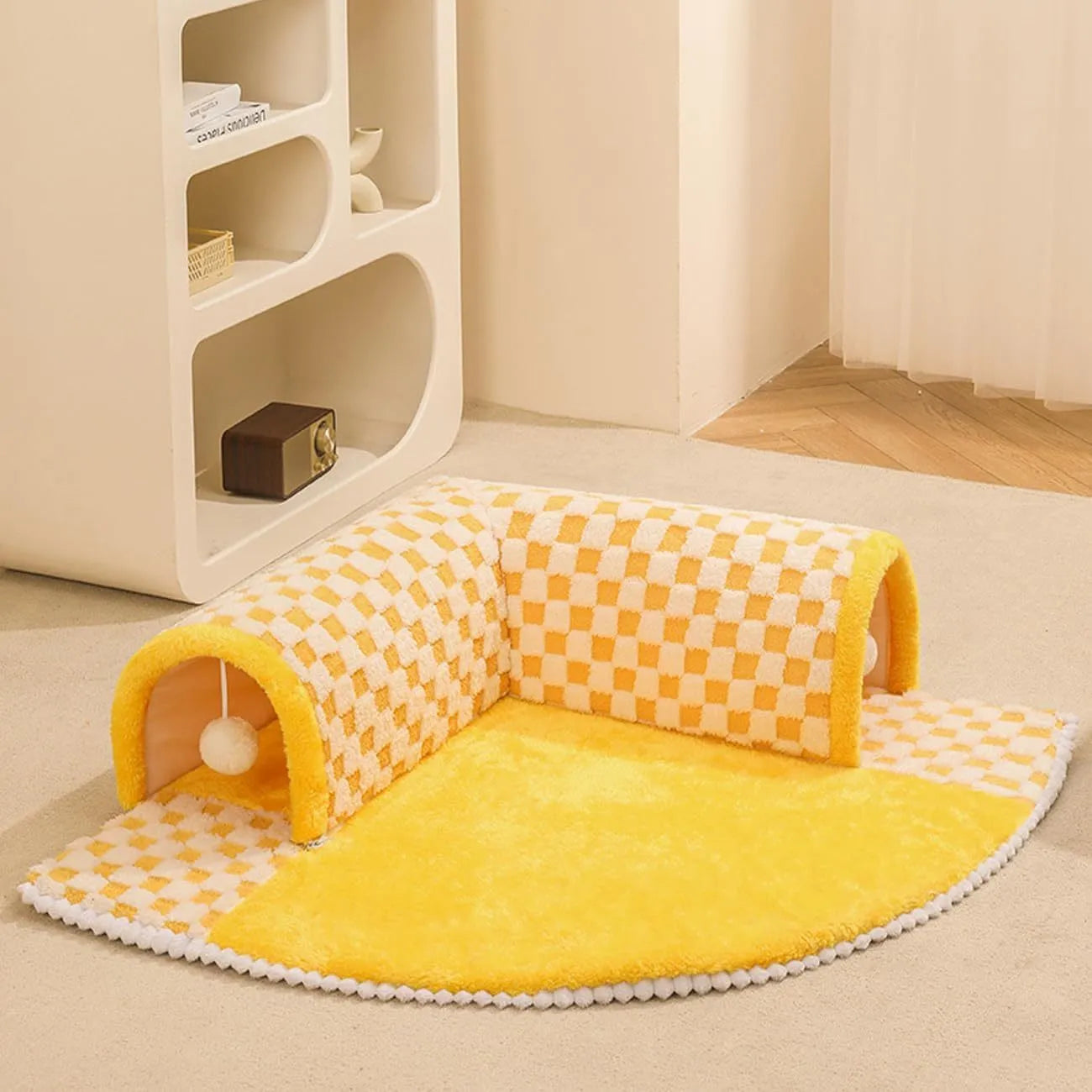 XL fan-shaped plush pet bed for dogs and cats with integrated tunnel in a plaid pattern.