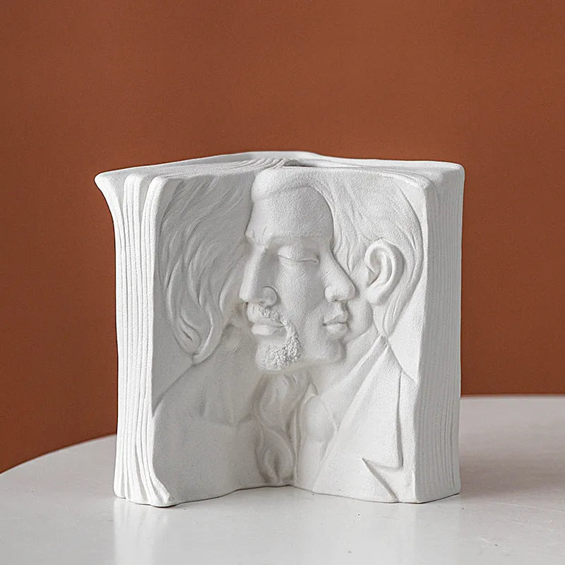Ceramic book stand in a modern simple style with a glazed decorative pattern, holding a book upright.
