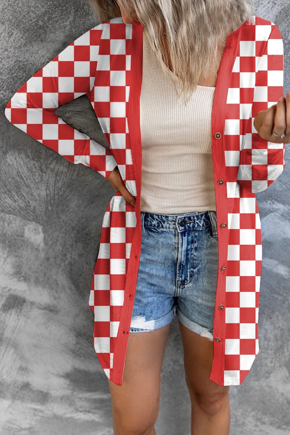 Women's long grey plaid knitted cardigan coat with regular sleeves on a hanger