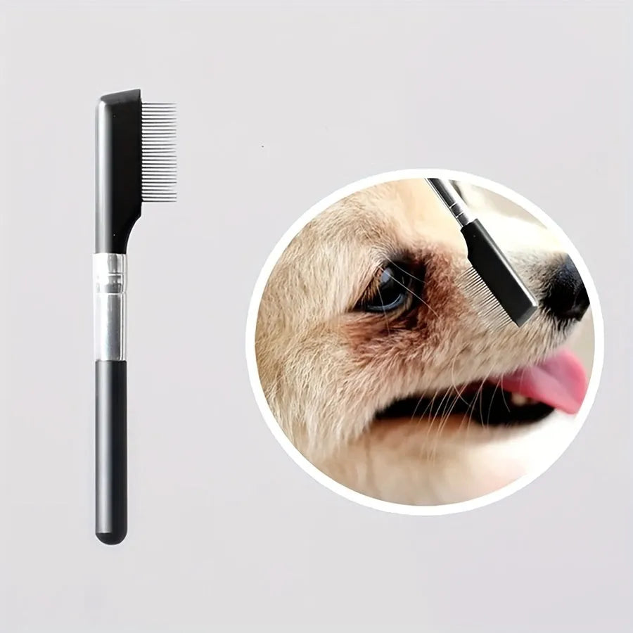 Black pet grooming brush with a soft rubber tear stain remover tool and a plastic comb on an ambidextrous handle.