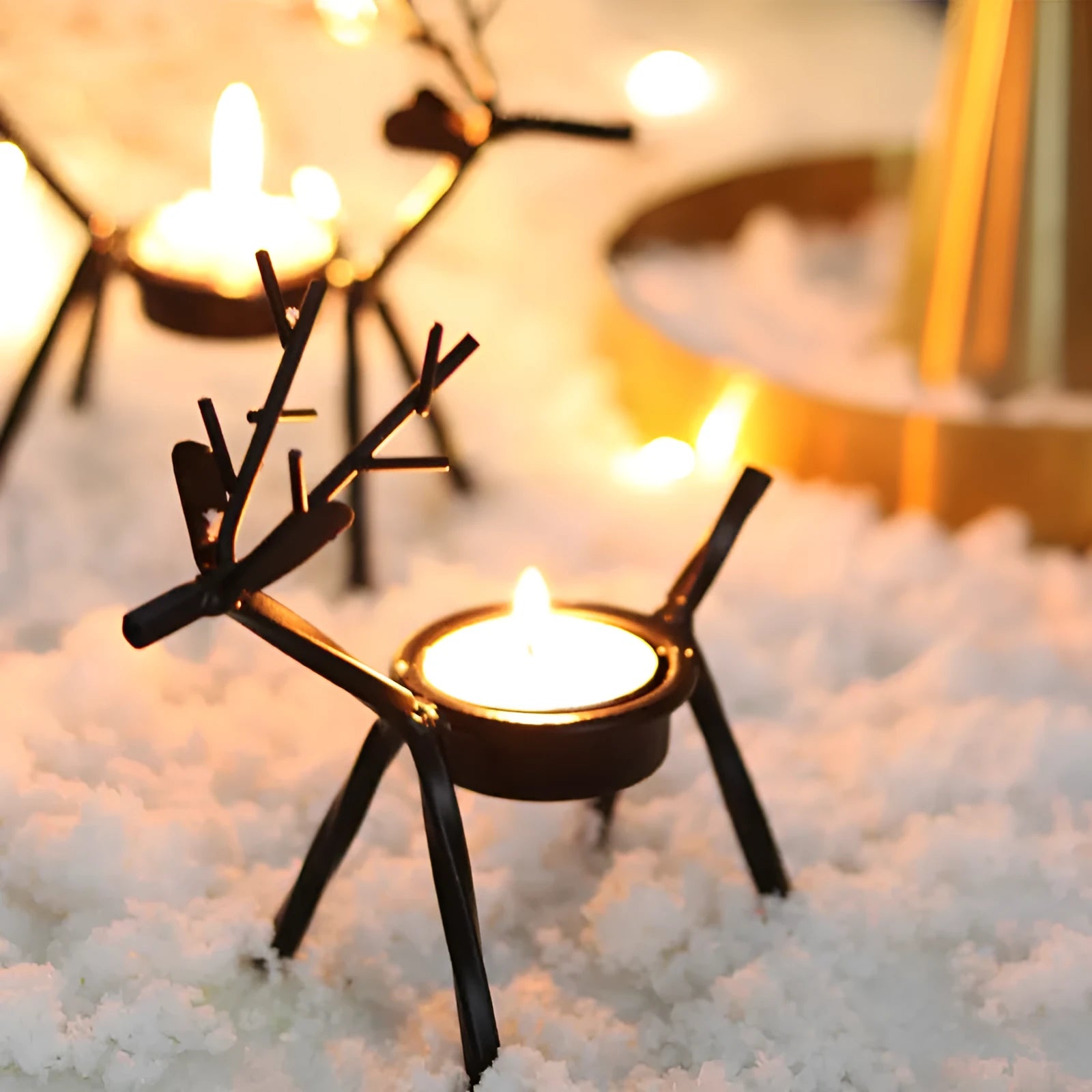 Black iron Christmas candlestick holder with creative elk bracket design for table decoration.