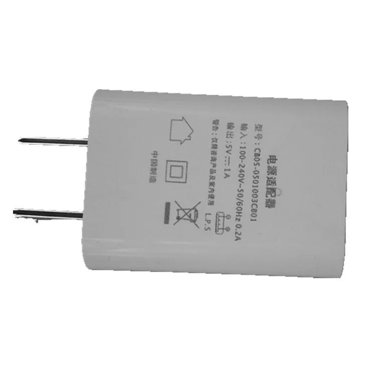 White 5V 1A USB wall charger with CE and FCC marks on a thin housing.
