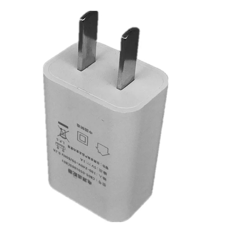 White 5V 1A USB wall charger with CE and FCC marks on a thin housing.