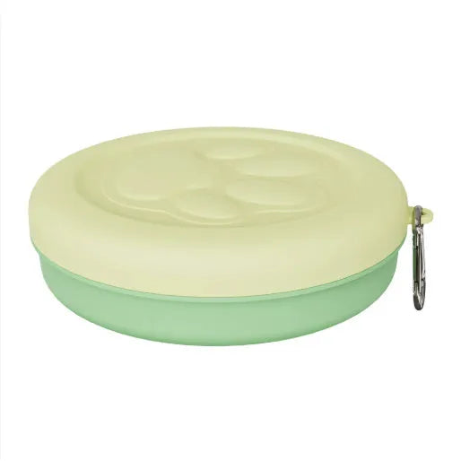 Folding portable dog bowl with snack compartment in pink and green colour options