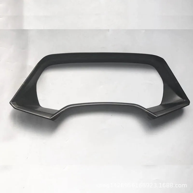 BMW X5 dashboard decorative frame in Peach Wood and Carbon Fibre finishes