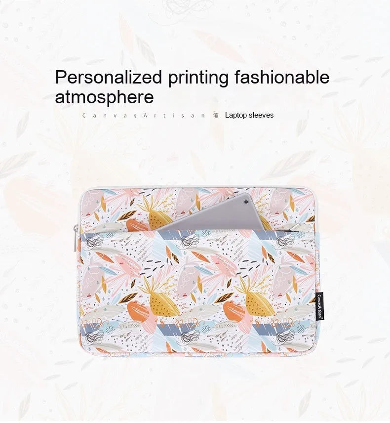 White waterproof PU leather laptop sleeve for 11 to 15 inch computers on a table.