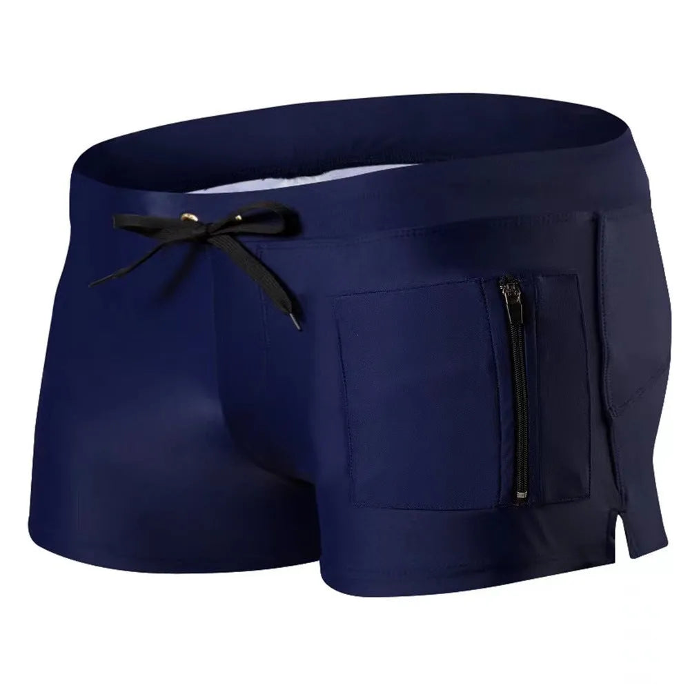 Men's black high-waisted swimming trunks with a white lace-up front detail, laid flat.