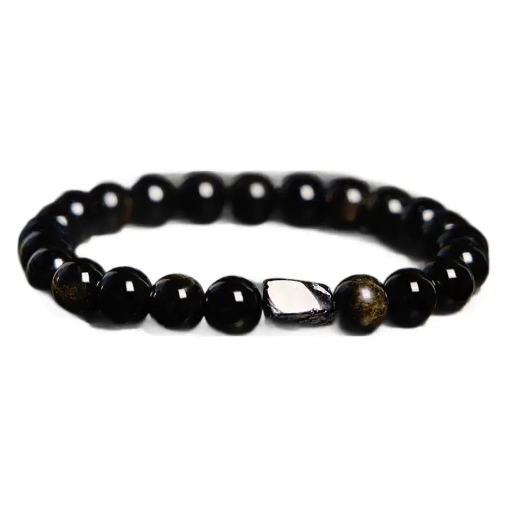 Natural obsidian bracelet with constellation design, 8mm wide, on a wrist.