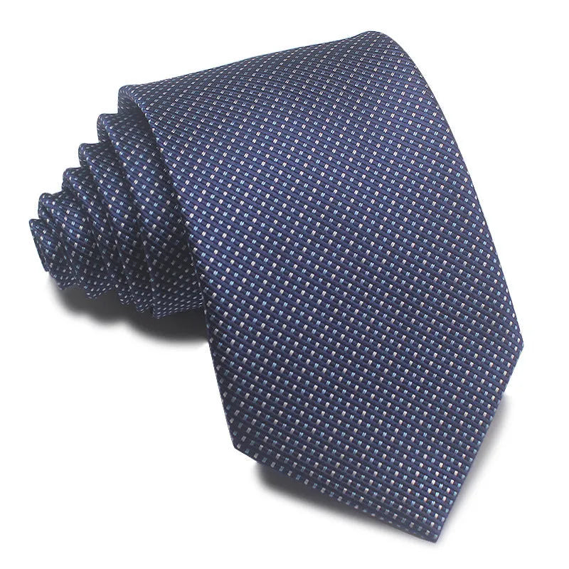 Close-up of a red, black, and blue striped men's formal tie with a textured Jacquard weave.