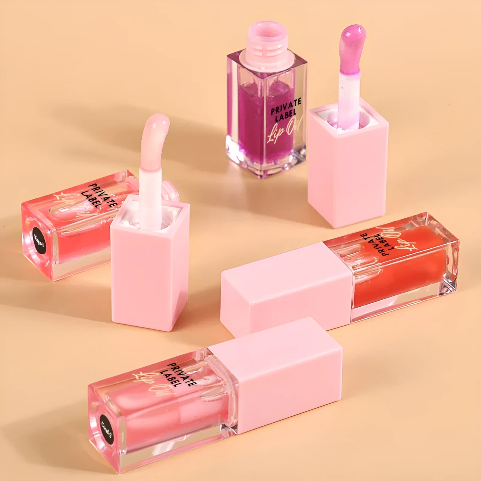 Set of six transparent lip gloss tubes in shades Bird of Paradise, Cherry, Coral, Mango, Strawberry, Watermelon