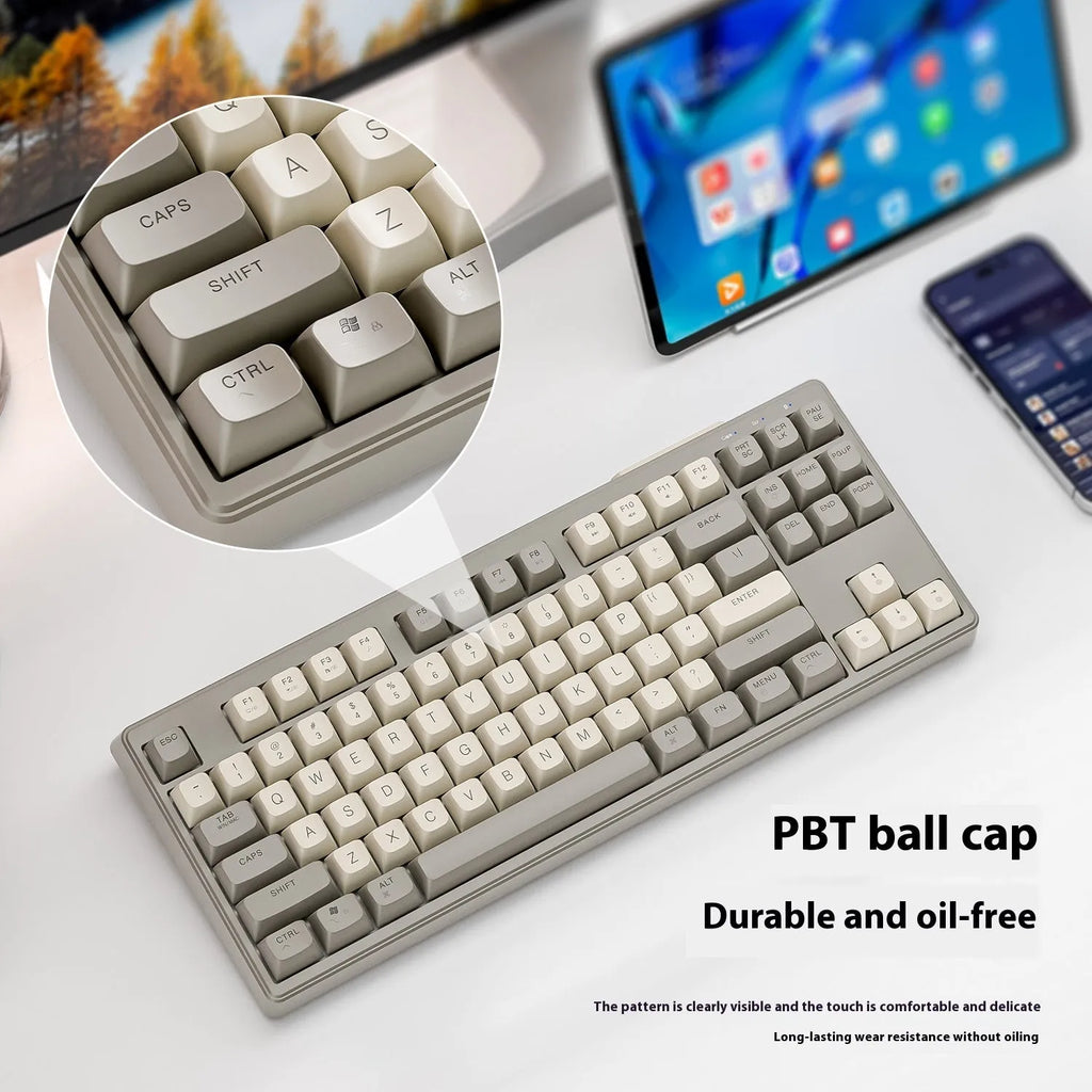 Wireless Bluetooth dual-mode mechanical keyboard with 87 keys in blueberry colour showing hot-swappable switches