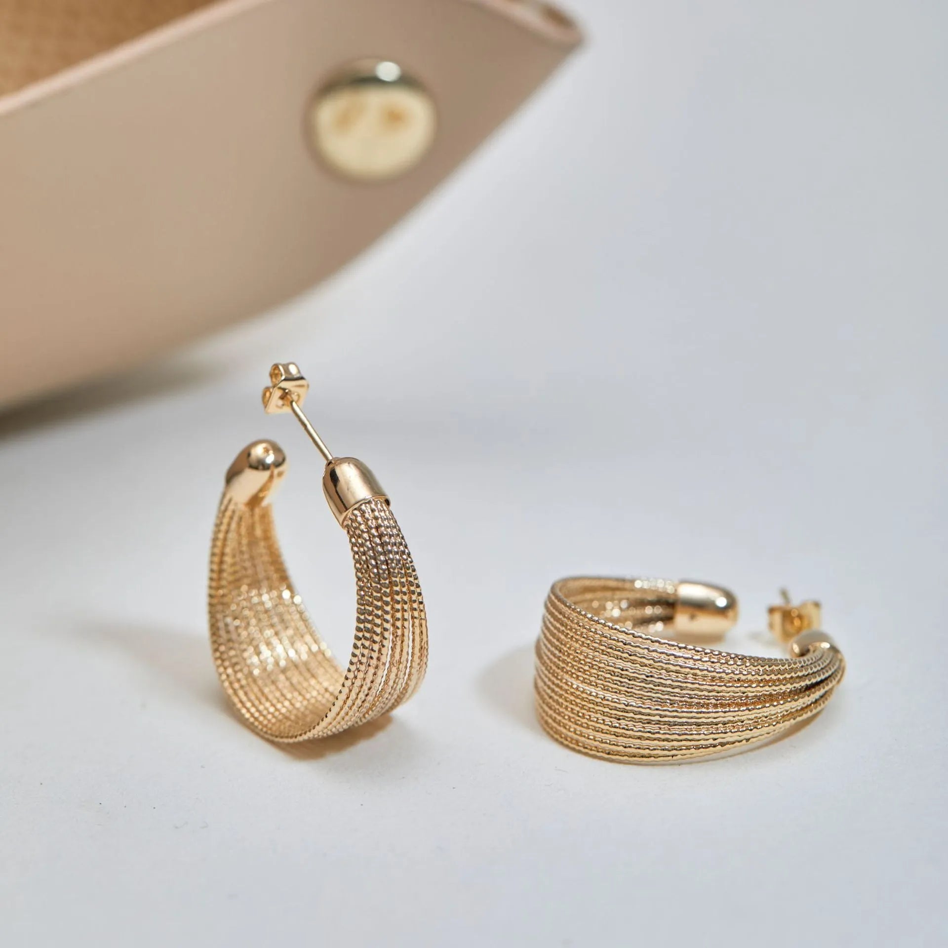 Geometric copper earrings with multi-layer bracelet design in gold and silver electroplated finishes
