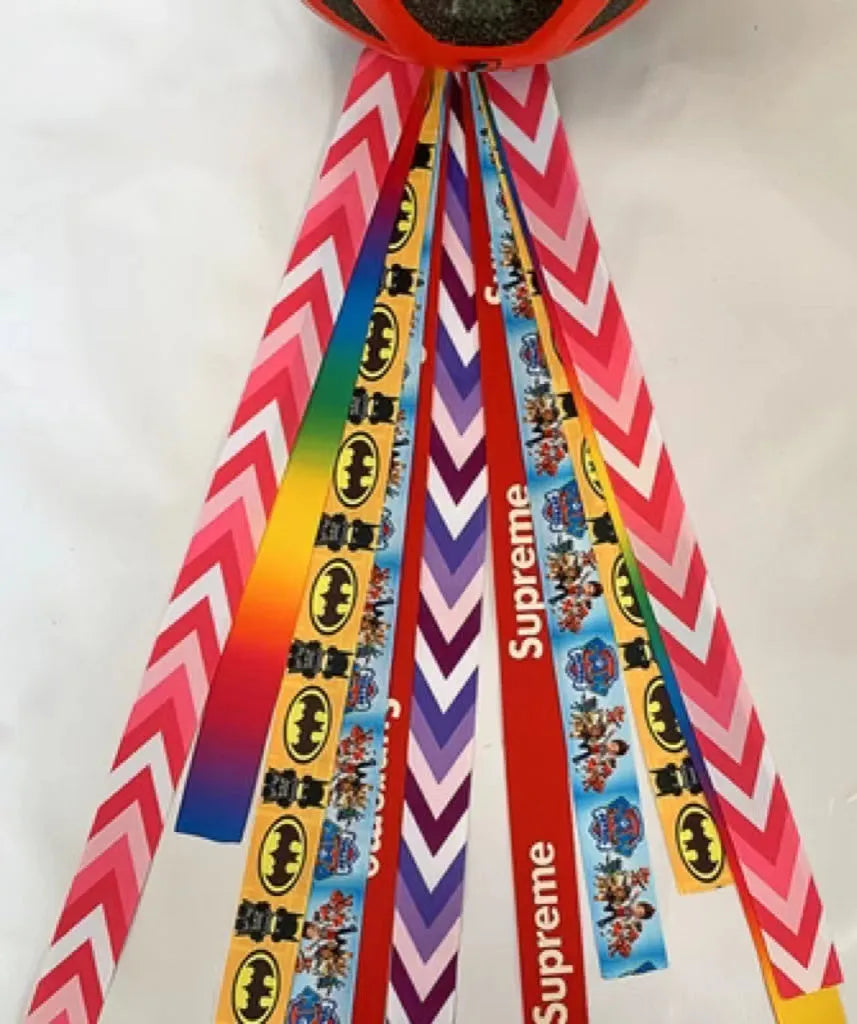 Children's decorative helmet streamer ribbon in multiple colours for roller skating and skiing safety gear.