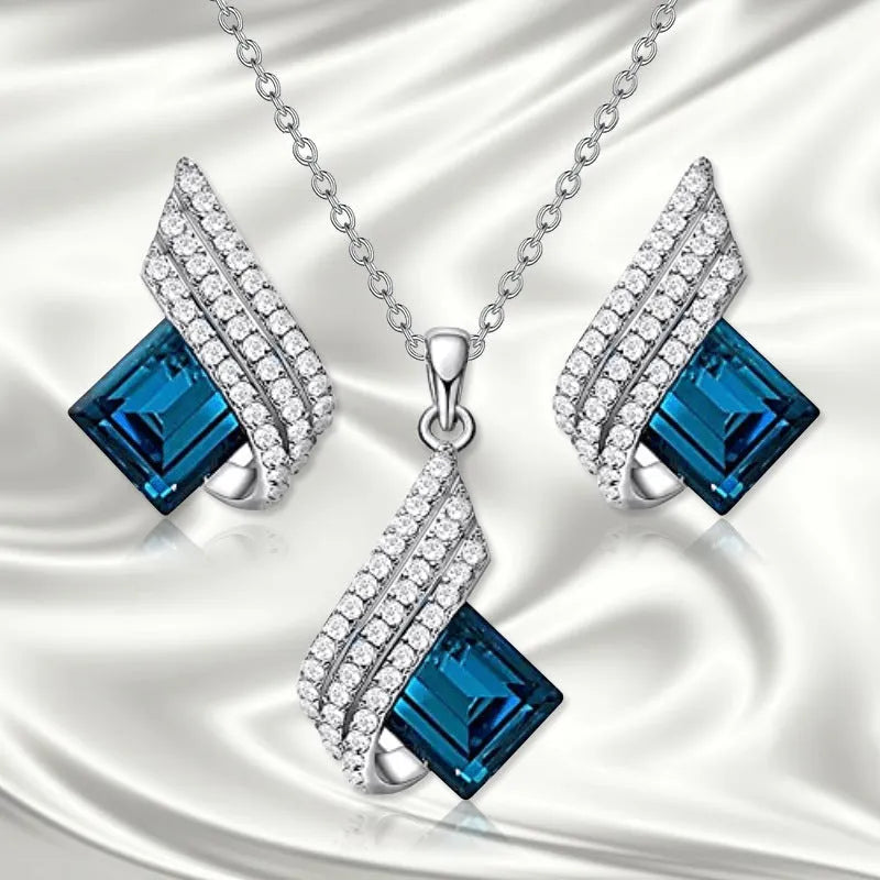 Necklace and earring jewellery set with cross chain design and alloy pendant
