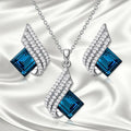 Necklace and earring jewellery set with cross chain design and alloy pendant