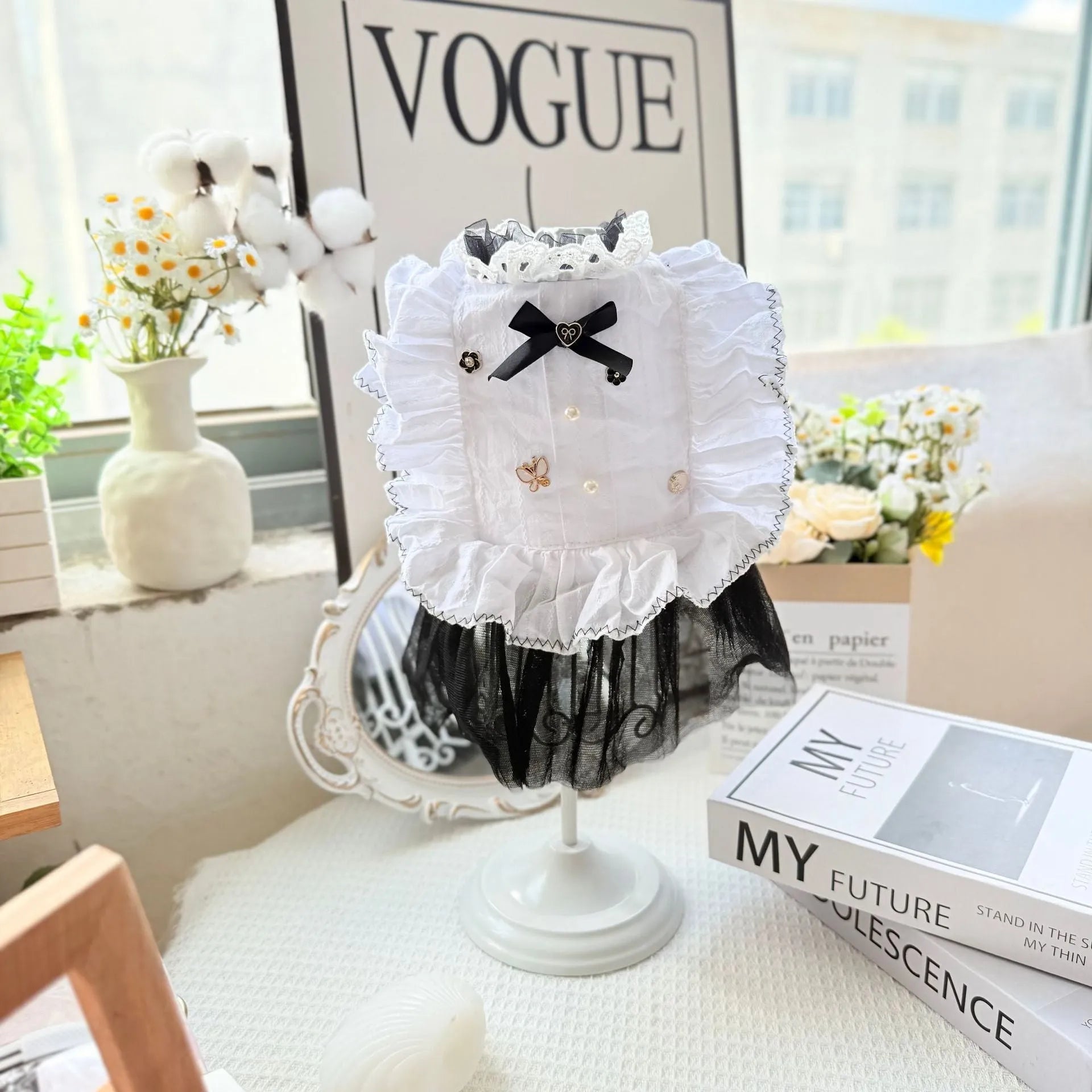 White polyester dog dress with gauze skirt in princess style, shown in size options for small dogs