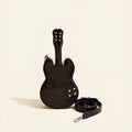 Guitar-shaped black crossbody shoulder bag made from PU leather