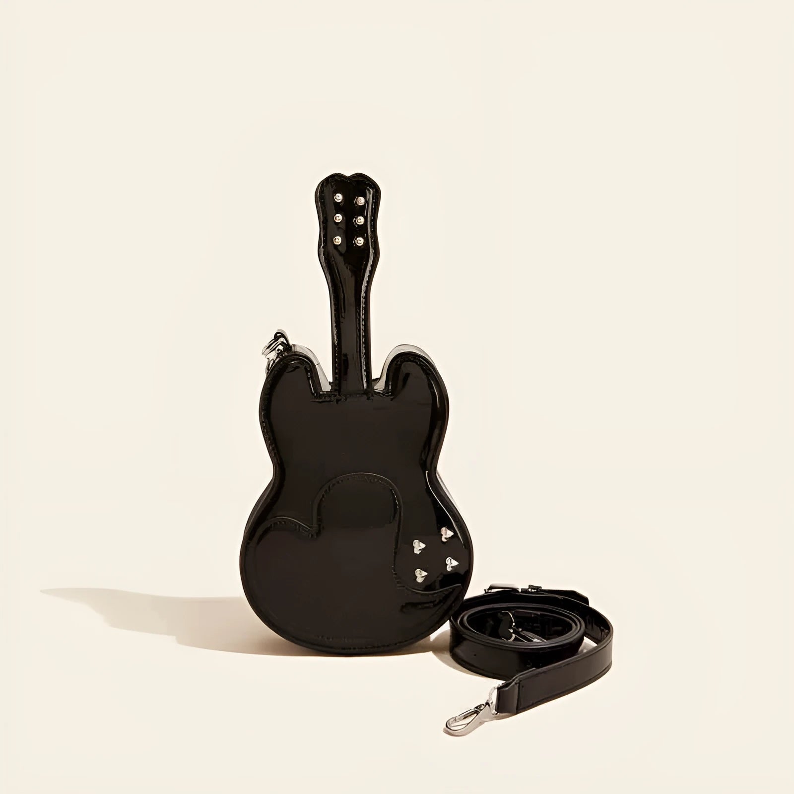 Guitar-shaped black crossbody shoulder bag made from PU leather