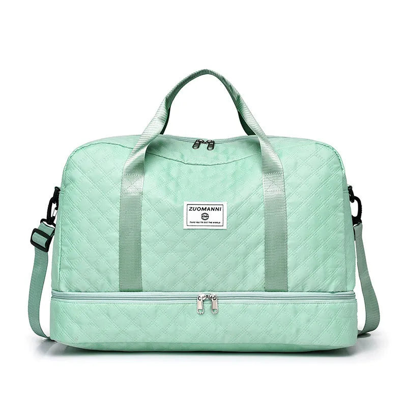 Oxford cloth travel bag with 36-55 litre capacity for leisure trips and buggy use in solid colour options