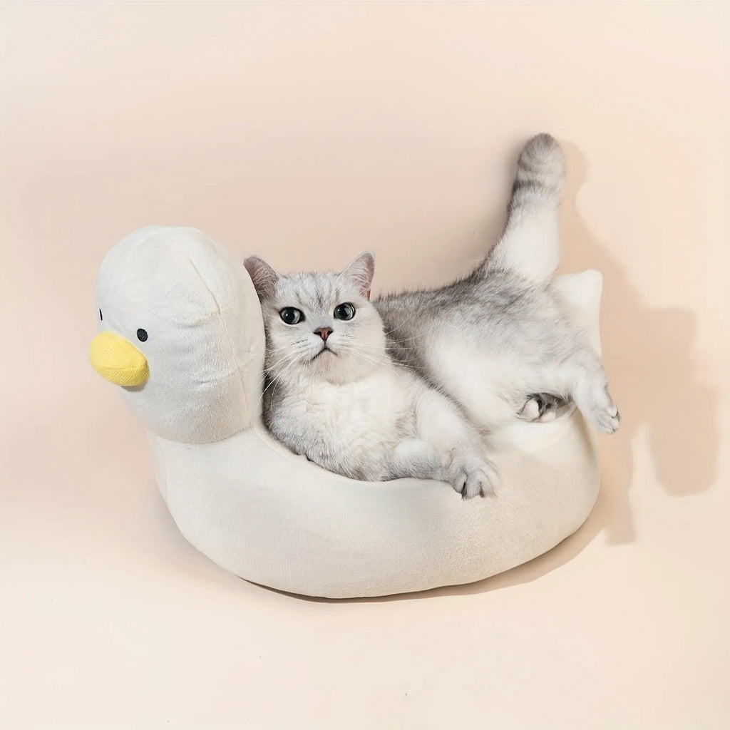 Duck-shaped fluffy pet bed in blue or white colours for small dogs and cats
