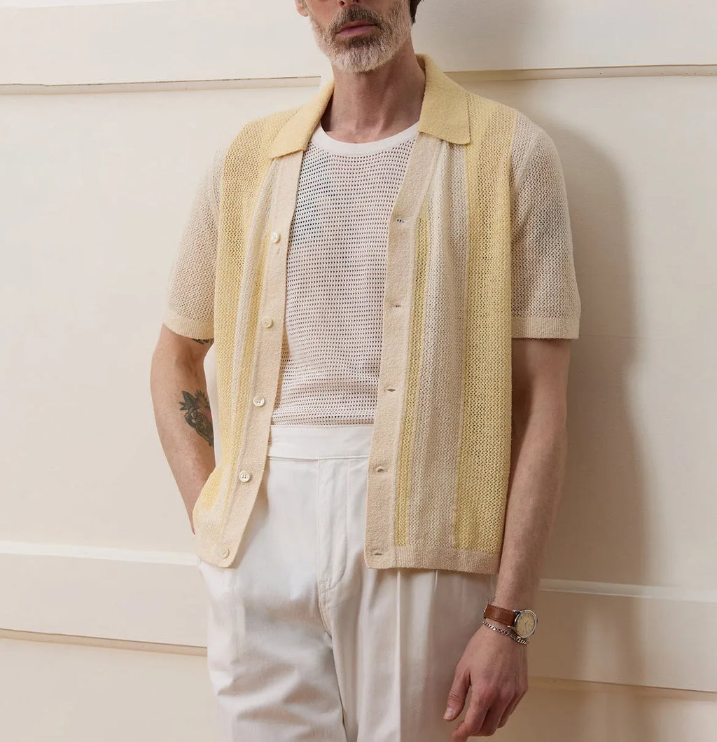 Yellow men's polo shirt with asymmetric design and short sleeves made from Tencel fabric