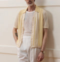 Yellow men's polo shirt with asymmetric design and short sleeves made from Tencel fabric