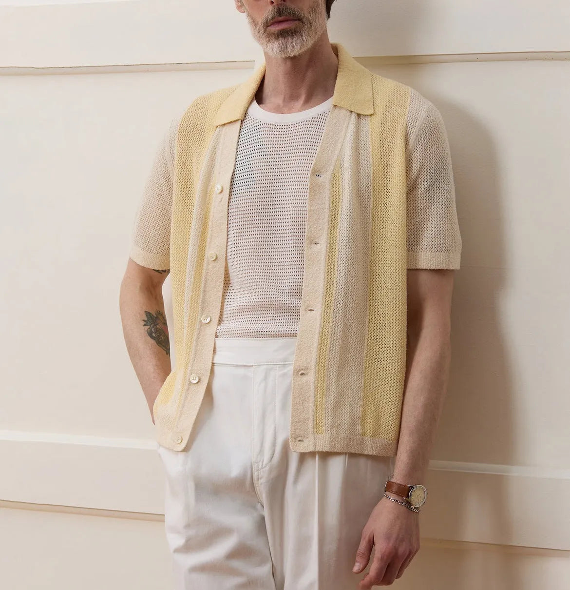 Yellow men's polo shirt with asymmetric design and short sleeves made from Tencel fabric