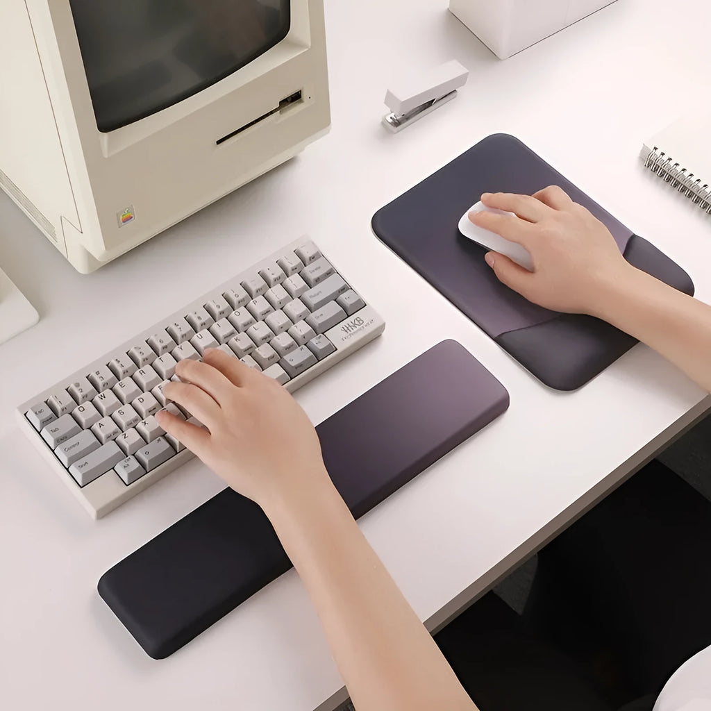 Square silica gel wrist rest mouse pad with strap on a desk, 250mm by 180mm, cloth surface