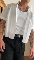 Men's white short sleeve polyester shirt with cropped length and regular fit plain design
