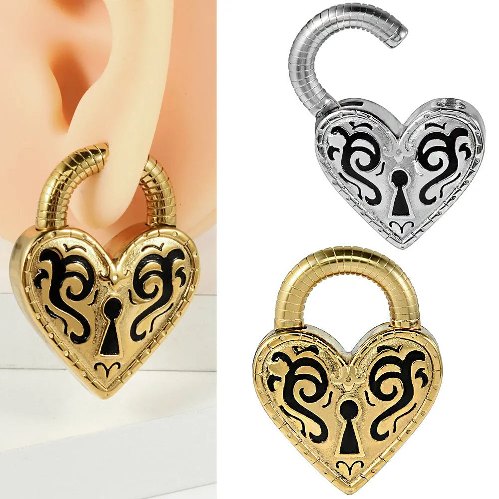 Women's stainless steel heart-shaped ear piercing studs in gold or steel colour options