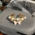Adjustable copper gourd ring with flower and bow design in New Chinese style featuring inlaid zircon stones