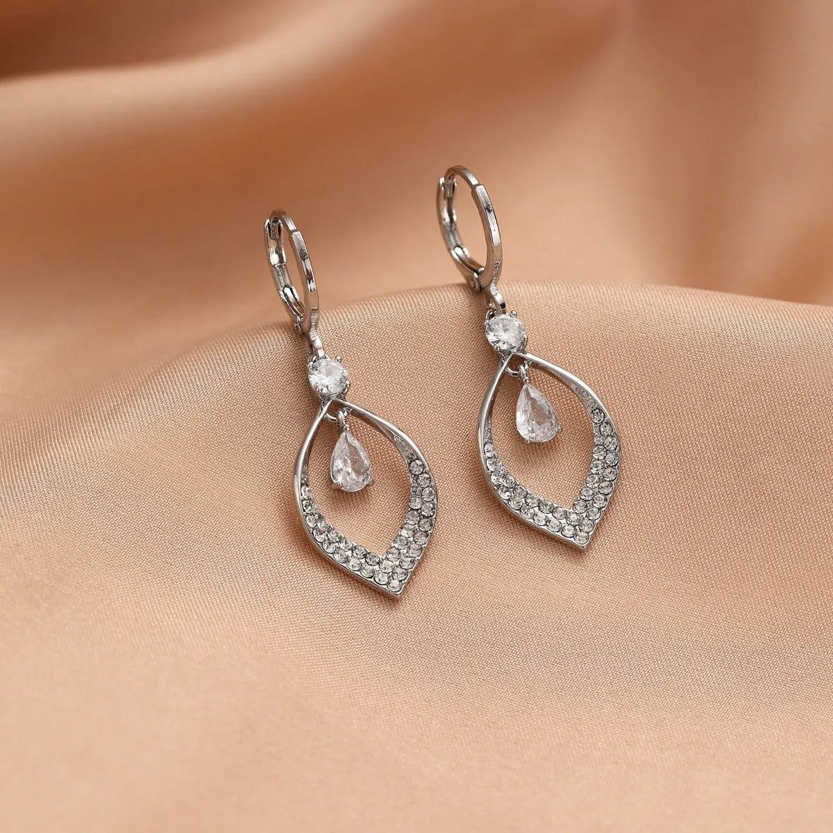 Women's copper zircon water drop tassel dangle earrings with gold or silver ear buckles.