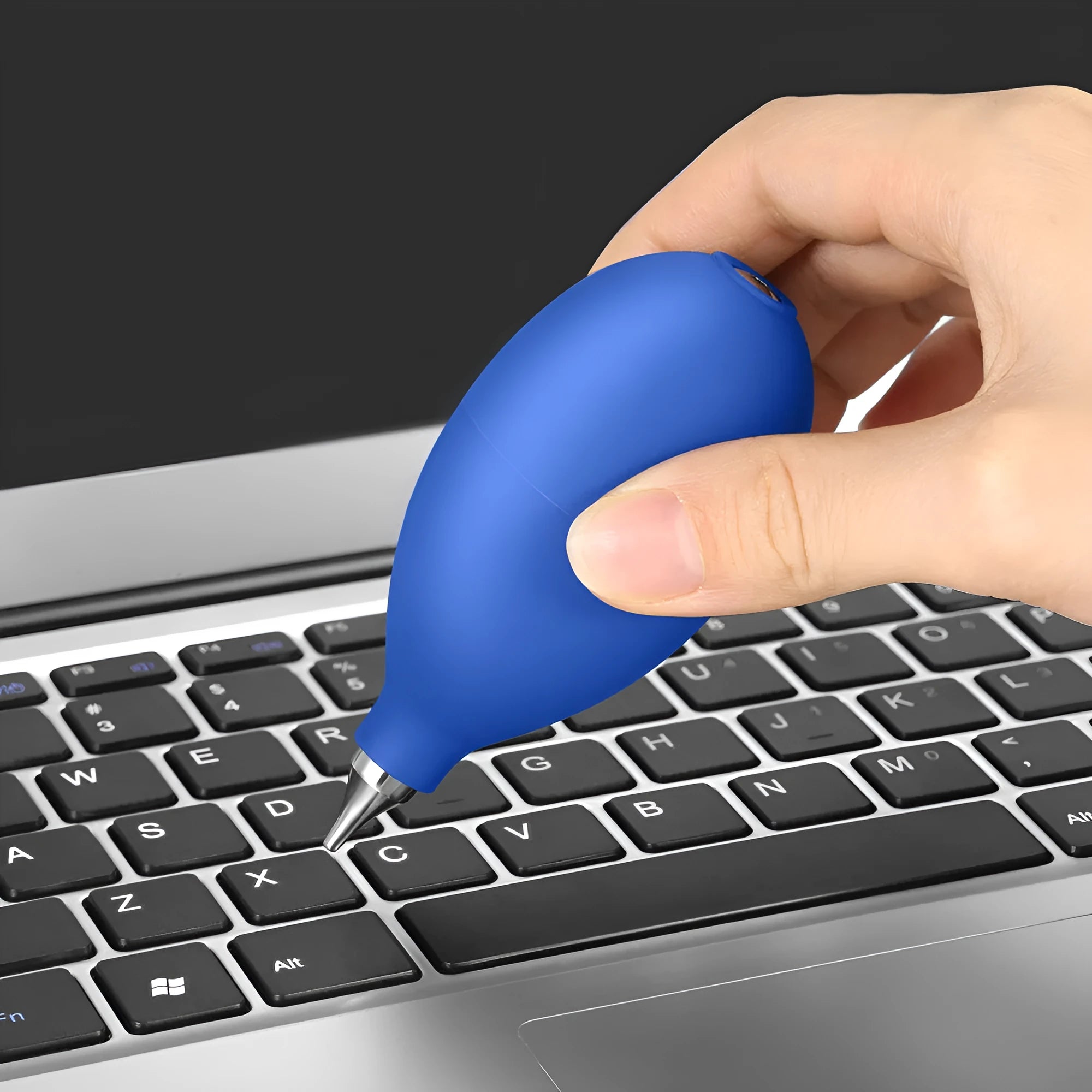 Blue rubber handheld dust blower cleaning tool for camera lenses and phones.