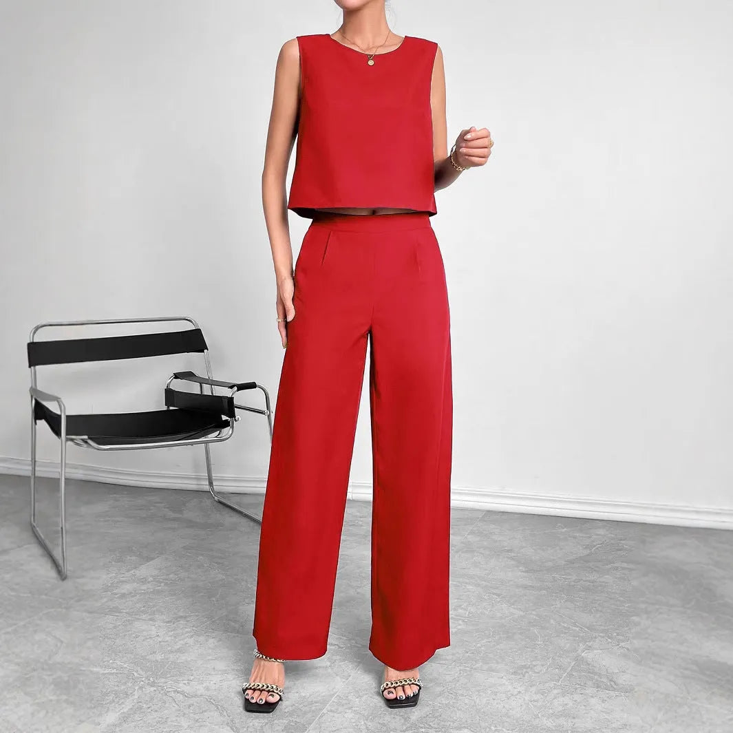 Red sleeveless top and wide leg trousers two-piece set for women on a hanger.