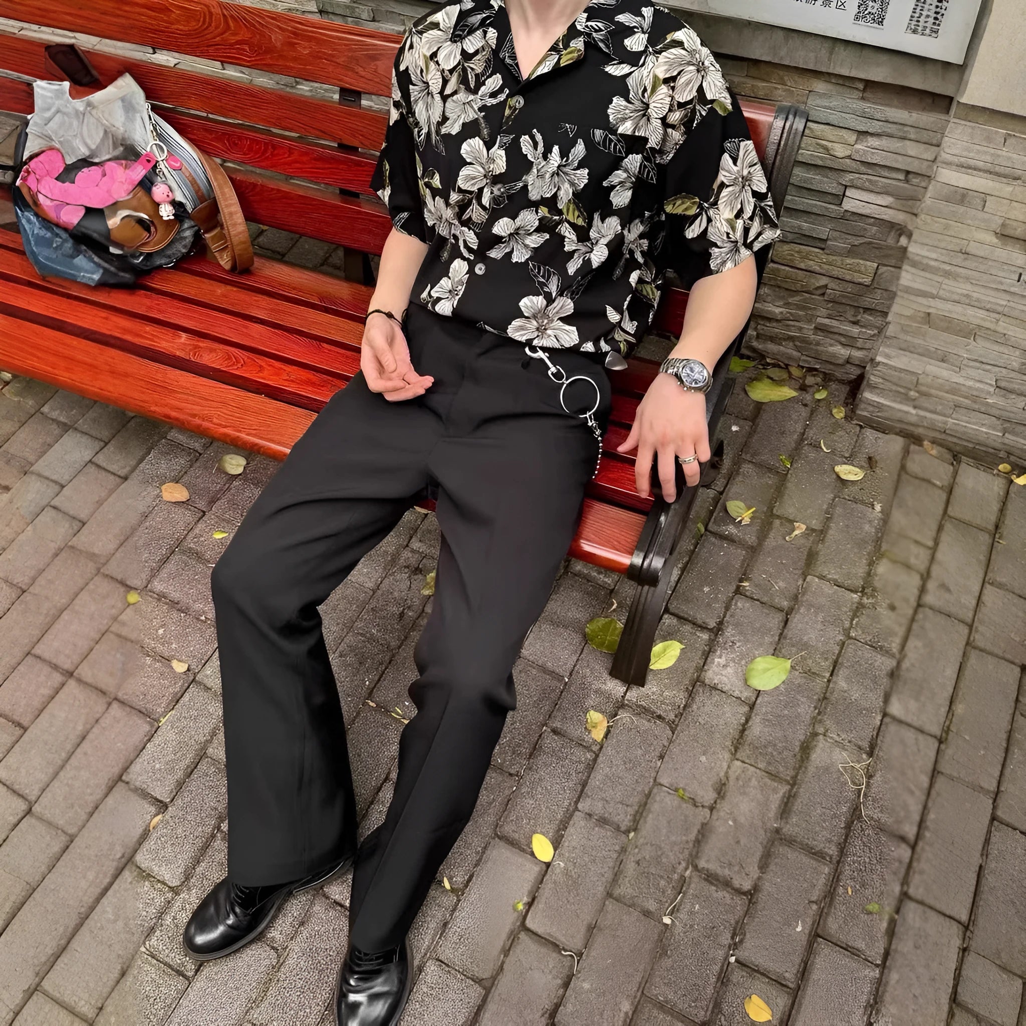 Black vintage Cuban collar ice silk shirt with flower print and short sleeves.