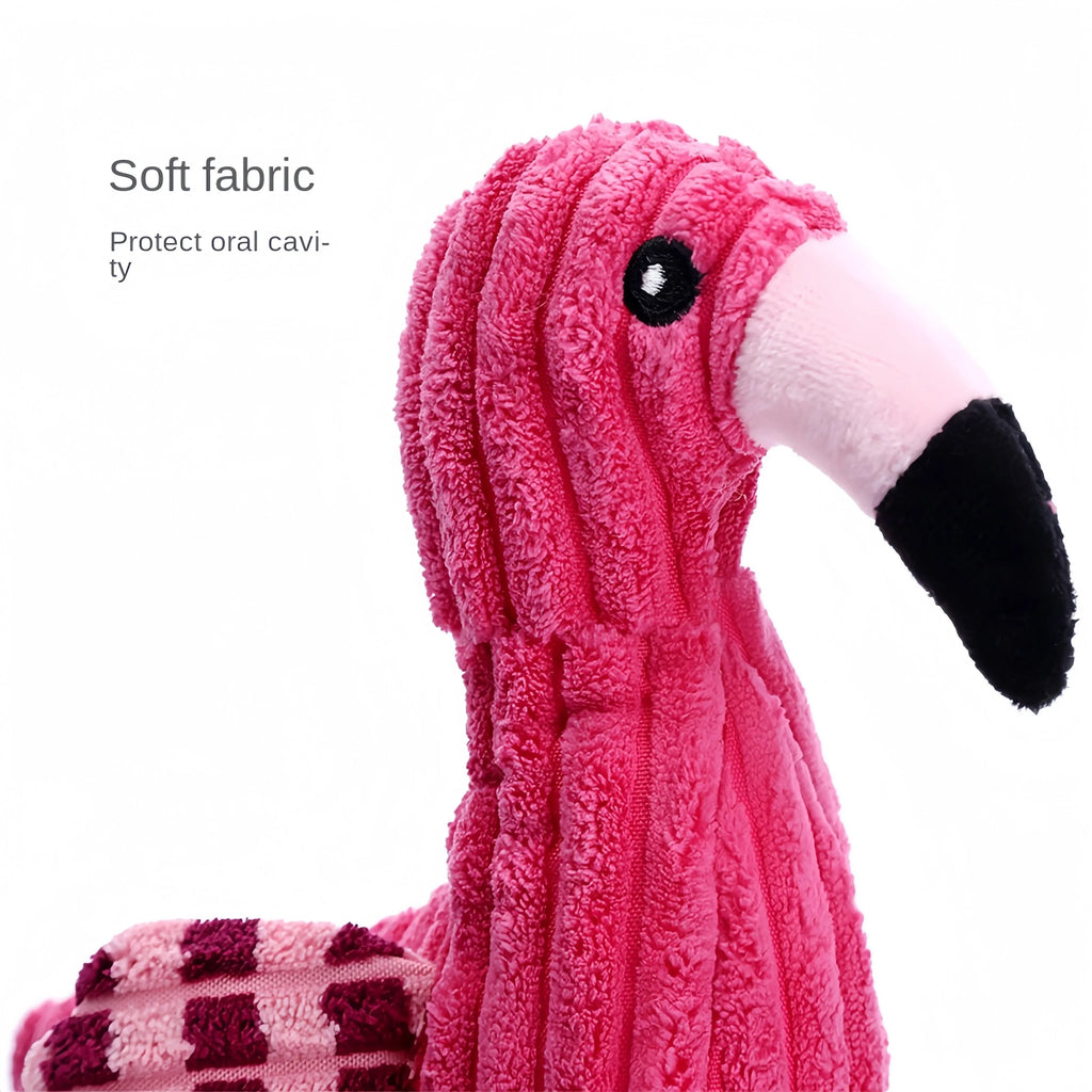 Pink corduroy plush dog toy shaped like a lion, elephant, or giraffe with a squeaker.