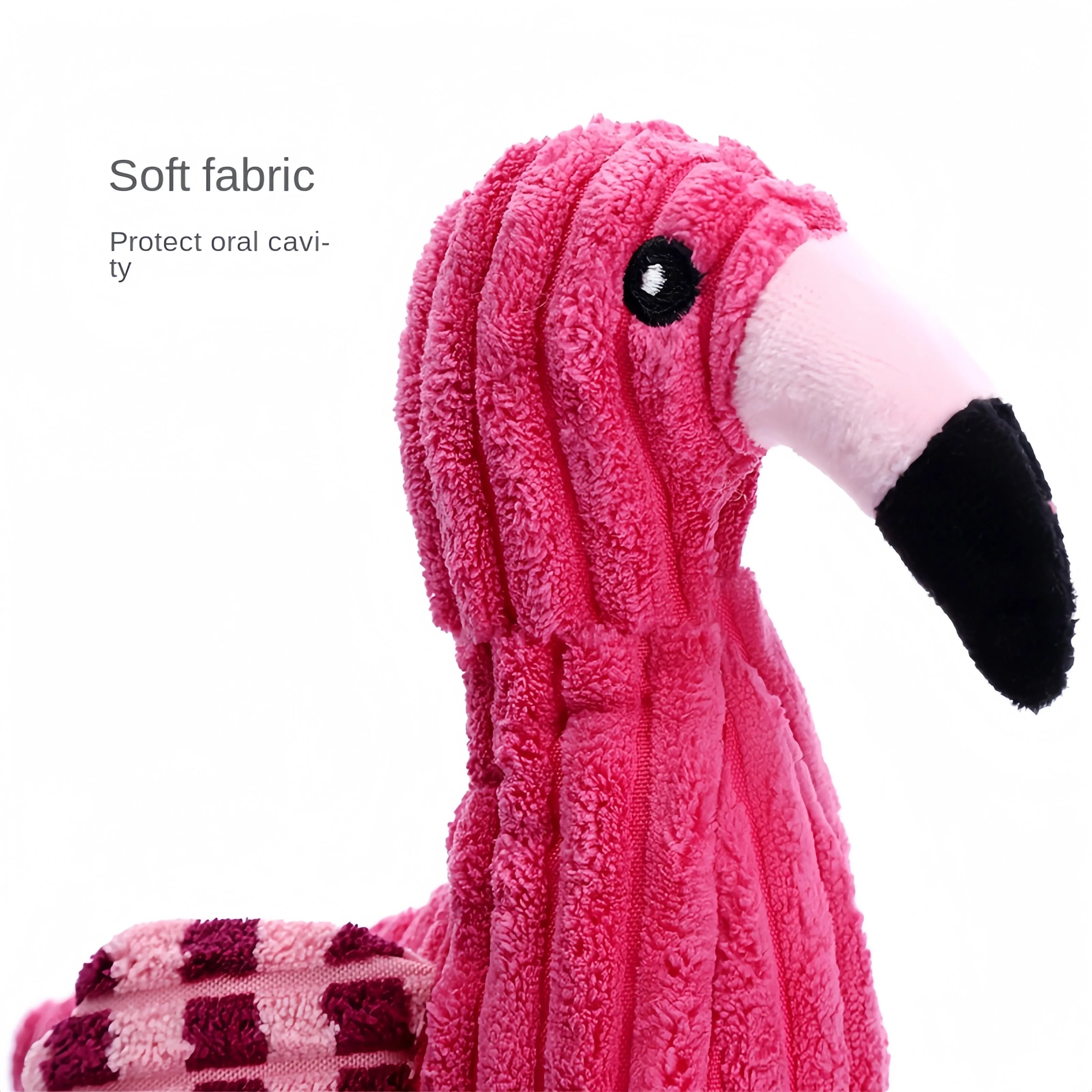 Pink corduroy plush dog toy shaped like a lion, elephant, or giraffe with a squeaker.
