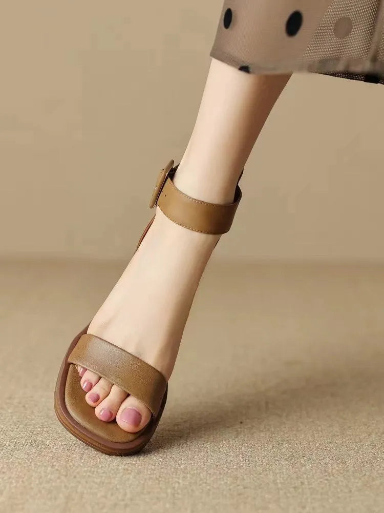Women's white retro platform high heels with ankle strap and rounded toe design