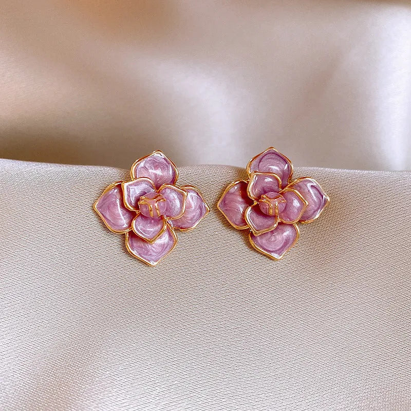 Gold plated purple oil-spot glaze flower stud earrings on copper with fresh floral design