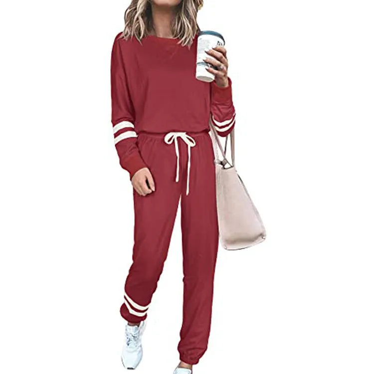 Women's plus size casual suit set in loose fit with long sleeves, shown in a solid colour.