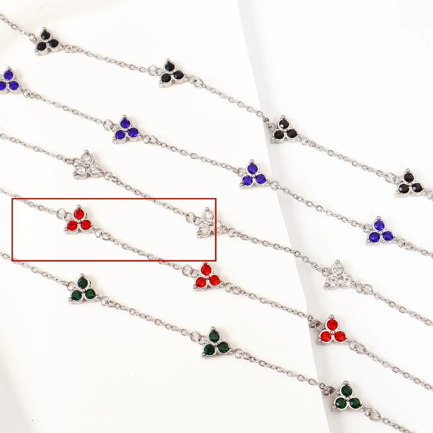 Women's geometric bracelet with triangular diamond cluster in gold or steel stainless steel with coloured stones