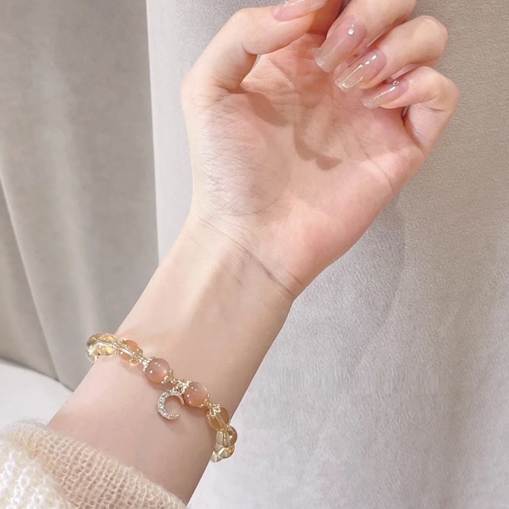 Women's Chinese-style crystal bracelet with citrine moonstone centrepiece and 14K gold electroplating