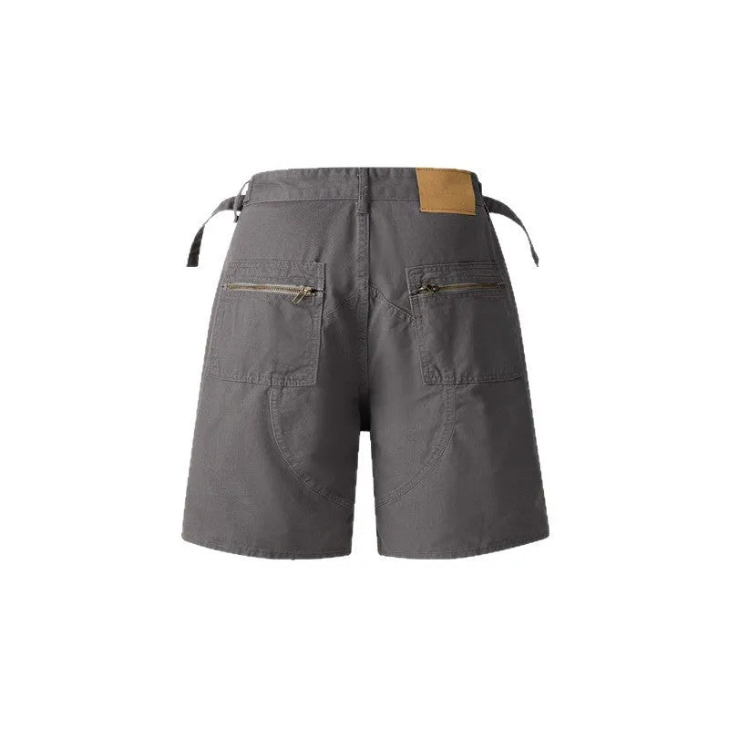 Retro washed cotton workwear shorts in loose fit with elastic waistband, shown in grey colour