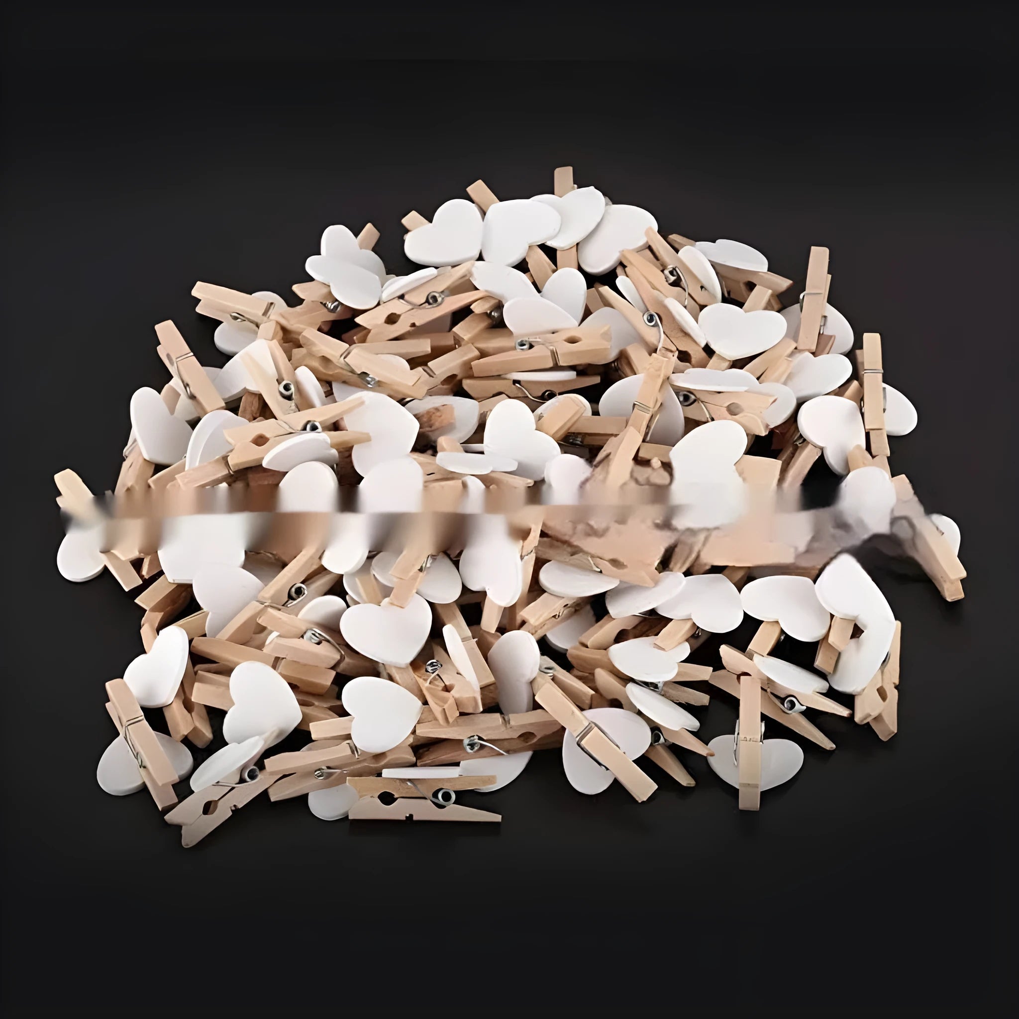Pack of five solid wood heart-shaped clips in assorted colours on a white background.