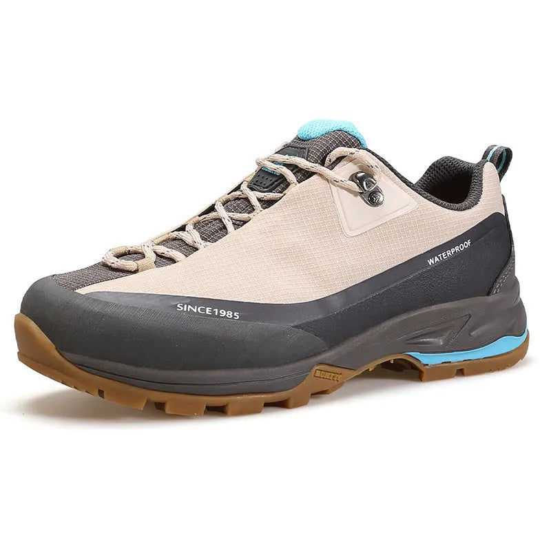 Men's low-top hiking boots in black with a leather mesh upper and rugged rubber outsole.