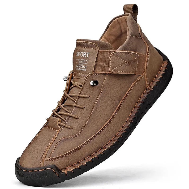 Men's mid-top Martin boot in a solid colour with elastic band and round toe.