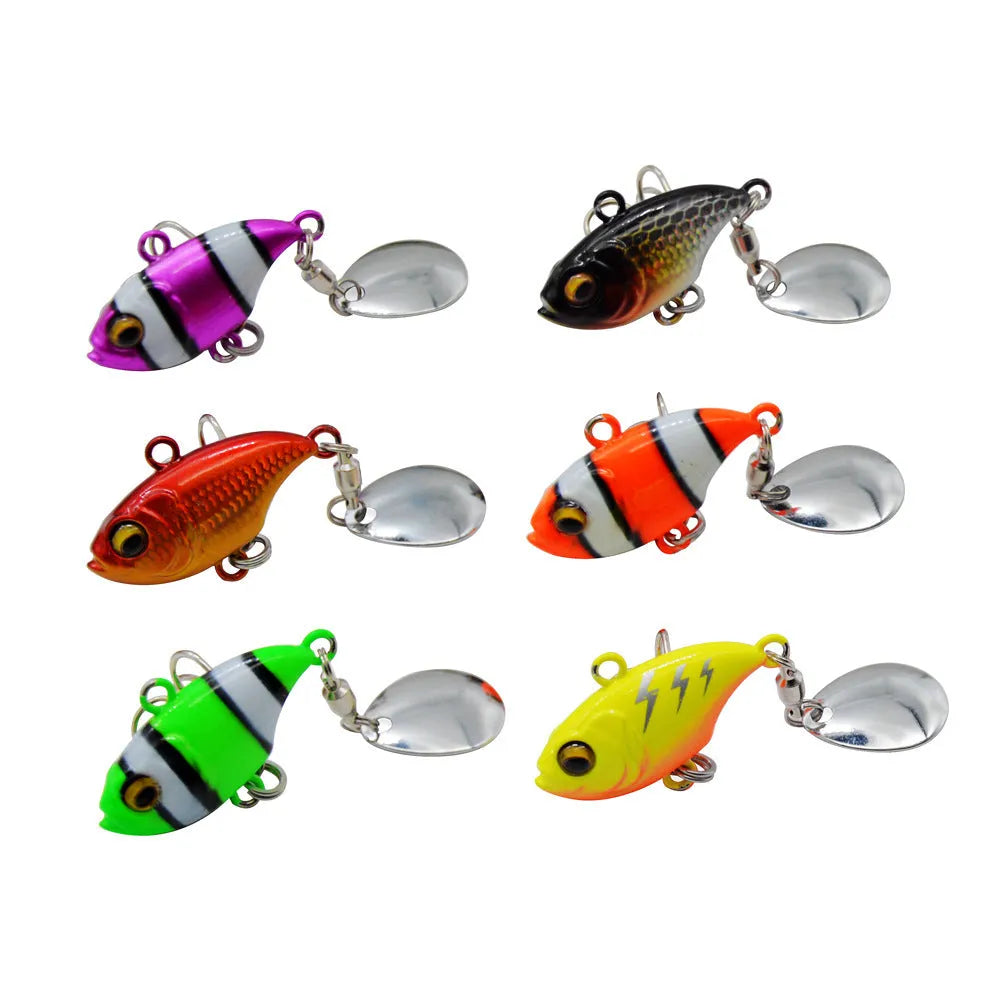 Metal sea fishing lure with rotating sequins in gold colour pattern