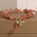 Women's pink strawberry quartz and white freshwater pearl bracelet with zircon accents on alloy chain